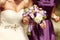 Detail and bride and bridesmaid with flowers