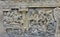 Detail of Buddhist carved relief in Borobudur temple.