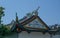 Detail of a Buddist temple in Wenzhou in China, lantern, roof and dragons - 1