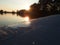 Detail canoe on a pond at sunset