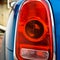 Detail of car headlights lamp, blue modern car tail red lamp