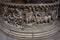 Detail, carved in stone in low relief, of the batesimal source in the basilica of San Frediano in Lucca.