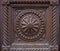 Detail, carved wooden surface of an old door, background