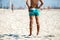 Detail of a children playing beach soccer. view behind the goal