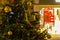 detail of Christmas tree and shop window with final sale sign, Prague, Czech Republic