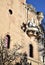 Detail, with circular balcony and flags, illuminated by the sun, of the Specola di Padova seat of the ancient astronomical observa