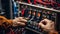 Detail close up of Electrician installing electric cable wires and fuse switch box with multimeter in hands