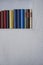 Detail of colorful books in a shelf, upright format