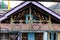 Detail of colorful Tibetan decoration of corridor and roof at Lachen in North Sikkim, India