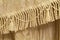 Detail of curtains with fringe and tassels