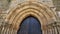 Detail of Door of Forgiveness on romanesque church of Santiago