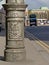 Detail of a Dublin lantern pole with embossed weapon shield