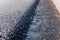 Detail of the edge of a freshly paved road