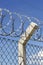 Detail of electric fence with concertina wire