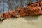 Detail of erosion of the roof of the crown of the wall, the fence of the garden. poorly fired bricks succumbed to erosion. water a