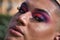 Detail of eyes of non-binary, young, South American person, heavily make up, close up. Concept queen, lgbtq+, pride, queer, eye