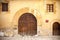 Detail facade door entrance gothic building palace,palau cambreria in historic center of Tarragona,Spain.