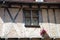 Detail of a facade of a half-timbered house from medieval times.