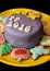 Detail of festive cake with the title PF 2016 and various ginger