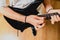 Detail of the fingers of a guitarist placed on the fret of the mast of the guitar playing a chord doing Tapping