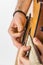 Detail of fingers and hand of guitar player