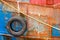 Detail. fishing boat. colourful rusty hull.