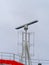 detail of a fishing boat radar in a harbour