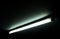 Detail of a fluorescent light tube on a wall