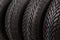 Detail of four winter tires stack background