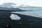 Detail of a glacial fragment of ice at Jokulsarlon glacier black