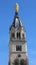 detail of the golden statue of the Madonna on the bell tower of