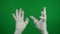 Detail green screen isolated chroma key photo capturing mummy& x27;s hands raised up in the air, creepily moving.