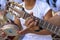 Detail of guitarist and his acoustic guitar at an outdoor presentation