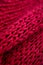 Detail of the handmade red knitting texture