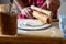 Detail of hands of men rolling the dough. Preparation for baking of traditional czech pastry. Homemade fresh food