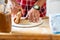 Detail of hands of men rolling the dough. Preparation for baking of traditional czech pastry. Homemade fresh food