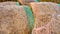 detail of hay bales in the countryside. rolled straw