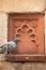 Detail of Isa Khan Niyazi tomb decoration with a sitting pigeon,