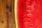 Detail of juicy watermelon on wooden table