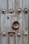 Detail of knocker and lock of ancient wooden door