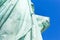 Detail of the Lady Liberty statue, book with the date of USA`s independence