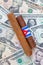 Detail of luxury Cuban cigars on the US dollars