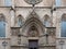 Detail of the main entrance of Basilica Santa Maria del Mar in typical Catalan Gothic with pointed arch and bronze main door. In