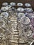 Detail of Many Crystal Glasses in Drying Rack