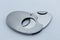 Detail of metal cigar cutter, white background