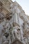 Detail of the Milan Cathedral, ancient cathedral church in the center of Milan, Italy.