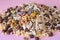 Detail of mixed cereals on pink background