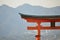 Detail of Miyajima - The wraiting on the torii is the name of the place, Itsukushima Jinja, in archaic language
