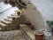 Detail from the Monastery of Paleokastritsa, corner with Arcade and stairs with flower pots, Corfu, Greece