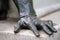 Detail of a monument showing the hand of a character